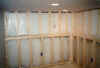 Framing the dart area next to the bar.  The shelf along the wall hides and supports the drain pipe.
